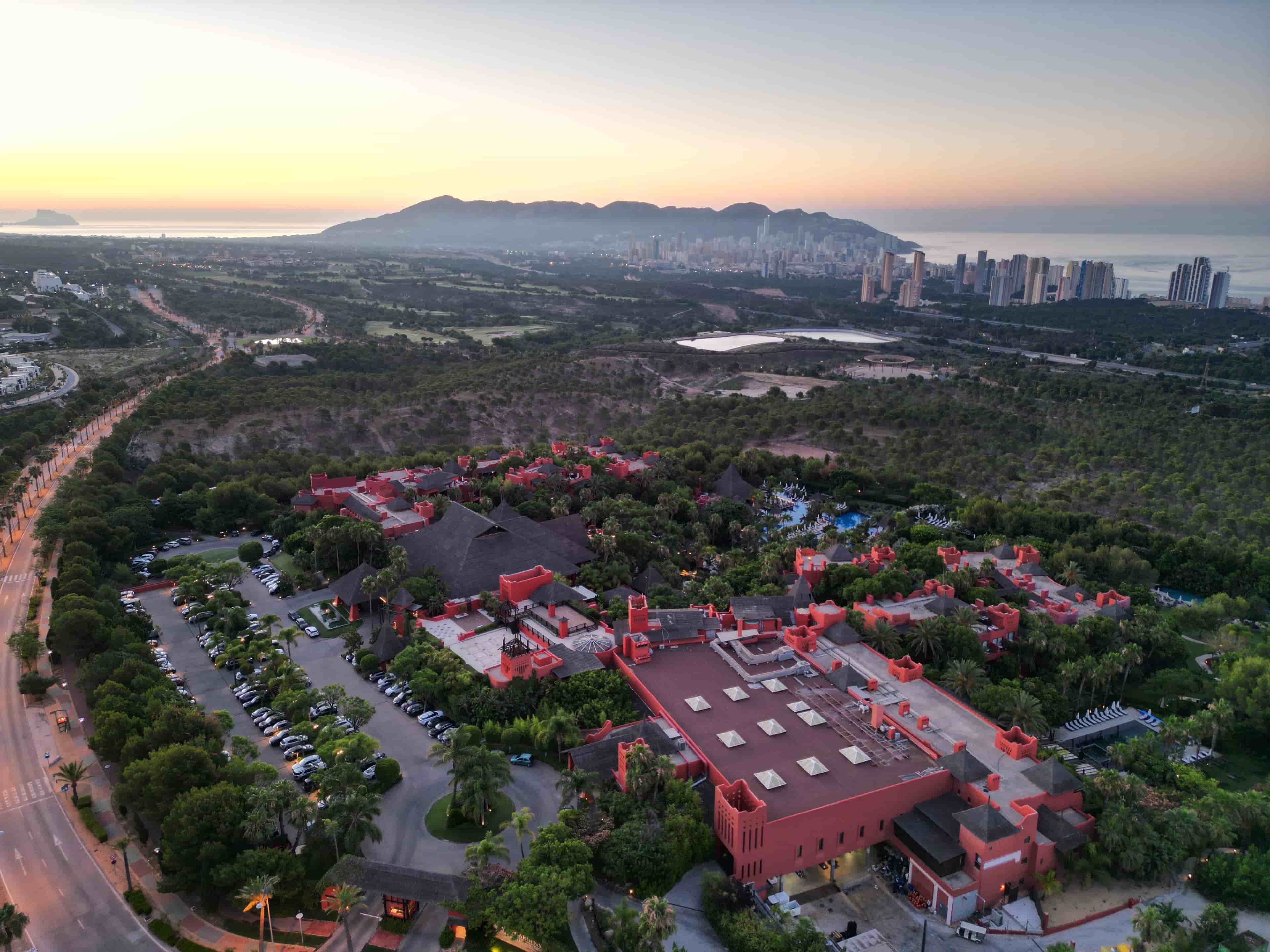 A commercial sun-rise drone photo shot for a 5-stars hotel in Benidorm, revealing the sunrise-touched scenery