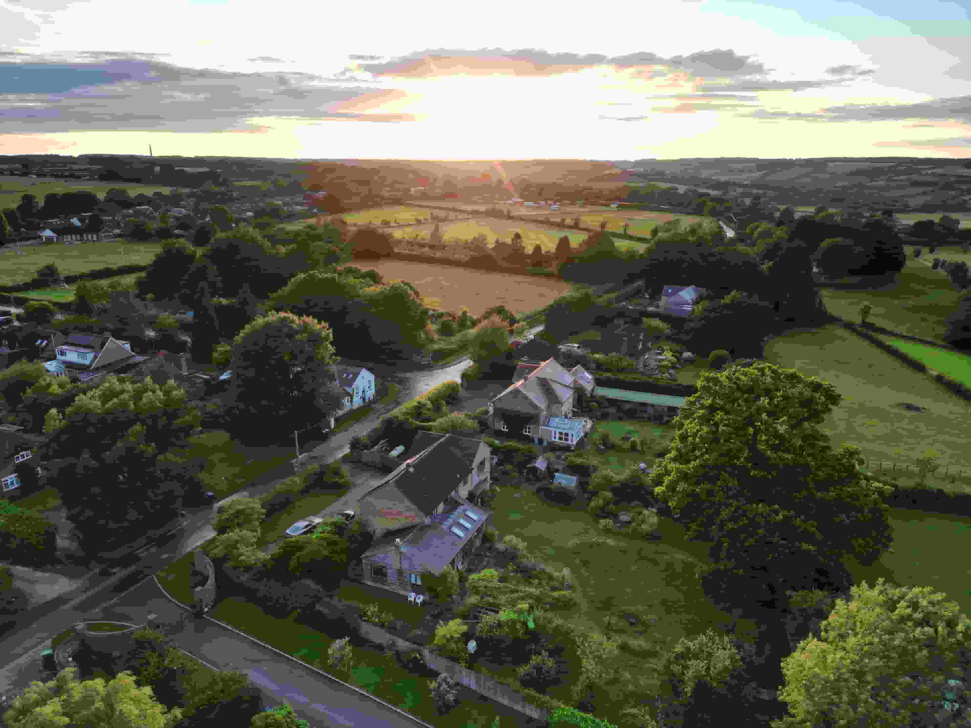 A sunset DJI Mini 3 Pro aerial drone shot commissioned as our Essence photo package for a Real Estate property located in Radnage, Buckinghamshire.